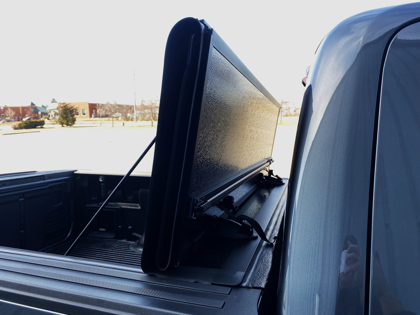 08 Hard tonneau cover flip up front.
