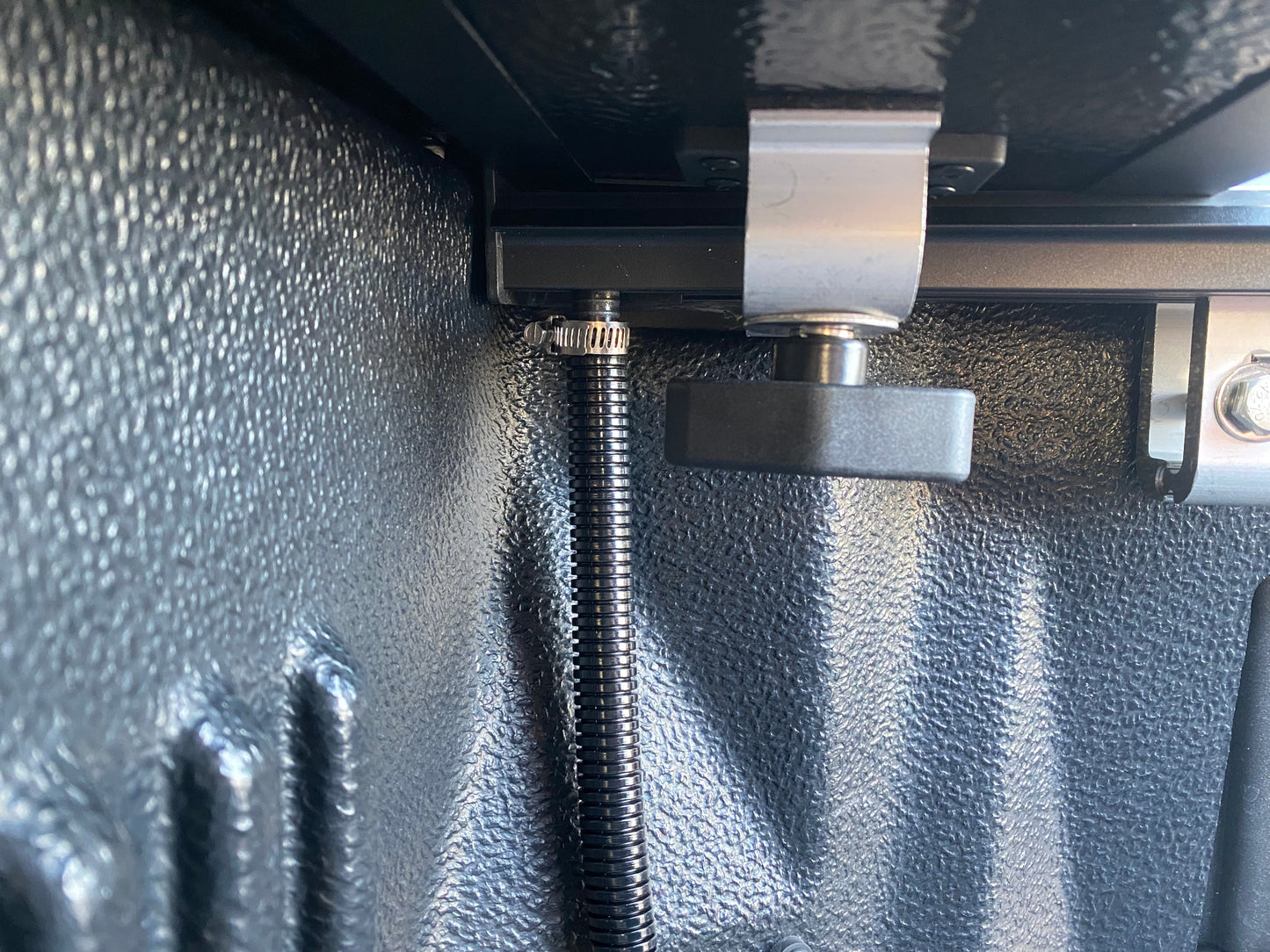 10 Hard tonneau cover front clamp.